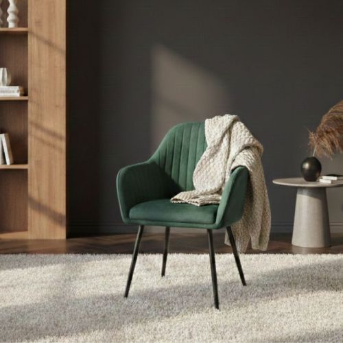 Poltrona imbottita in velluto verde petrolio con gambe in ferro nero